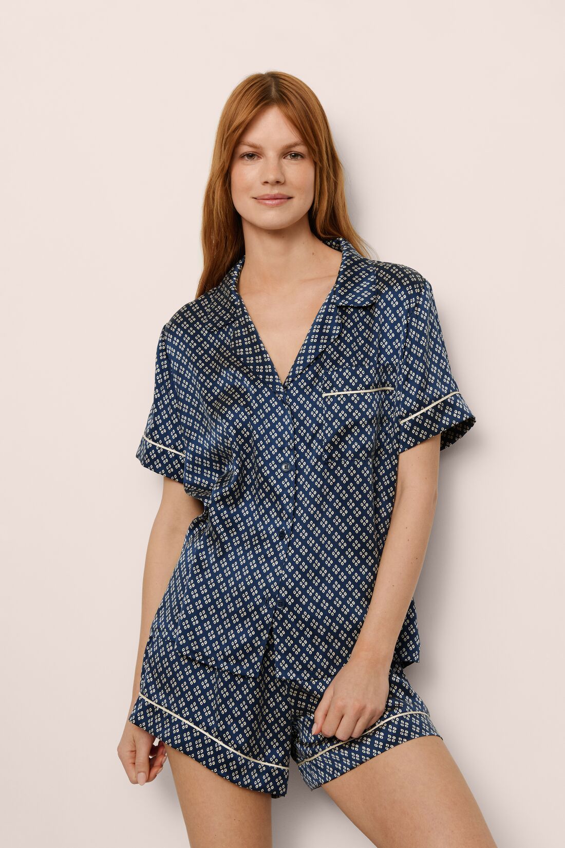 Model Is Wearing Inez Printed Short Pj Set In Petite Batik Indigo Blue