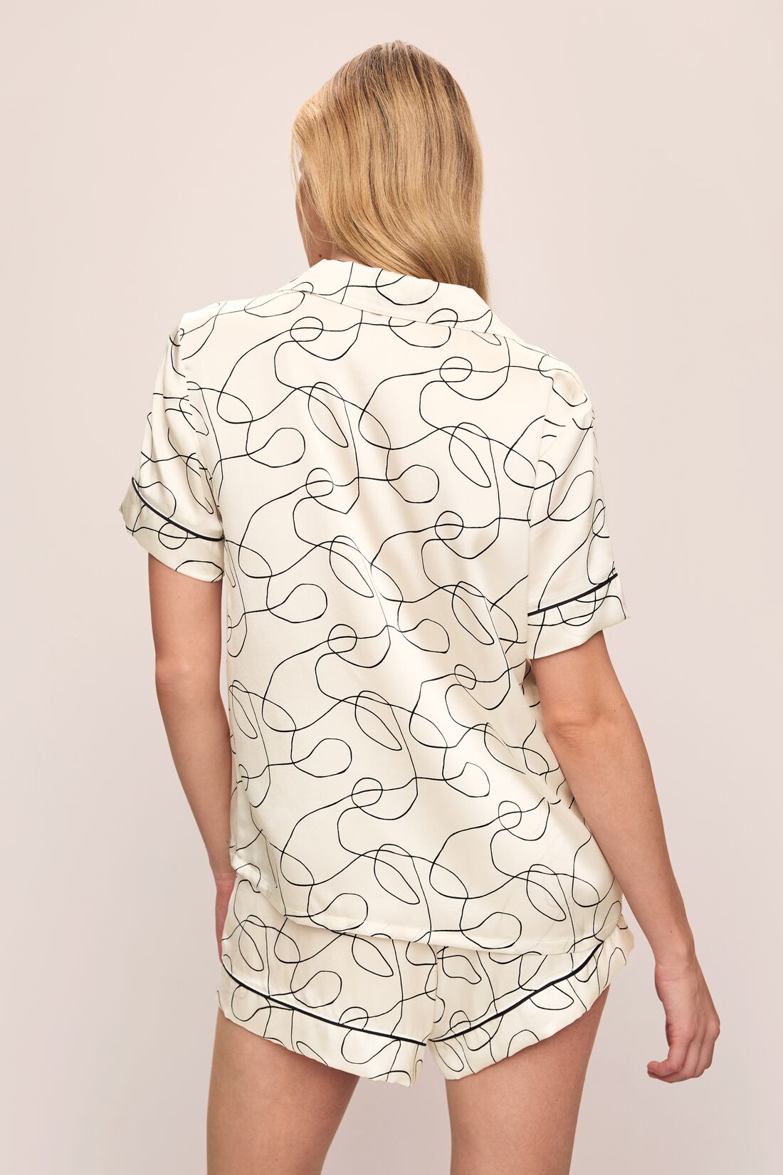 Back detail image of model wearing Inez Washable Silk Printed Short PJ Set in Scribble Ivory/Black