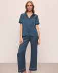 Model wears Inez Washable Silk Printed Short Sleeve Pant PJ Set in Petite Batik Indigo/Bone.