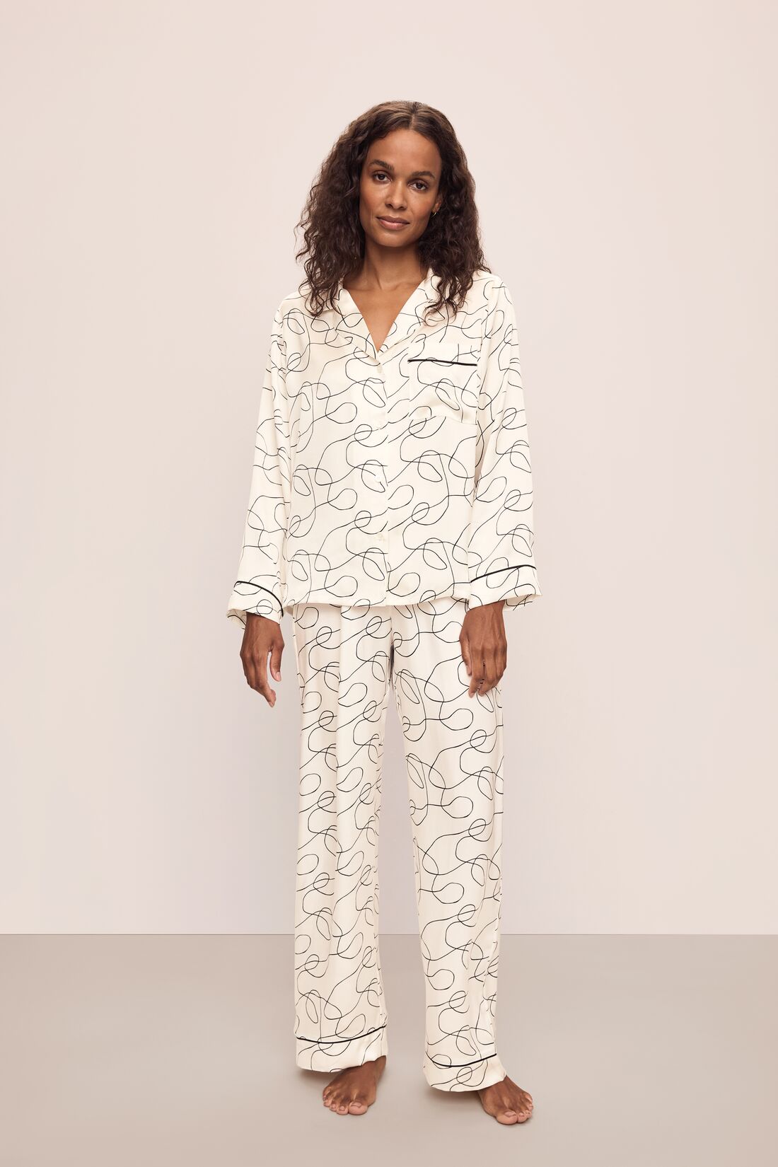 Model wearing Inez Washable Silk Printed Long PJ Set in Scribble Ivory/Black