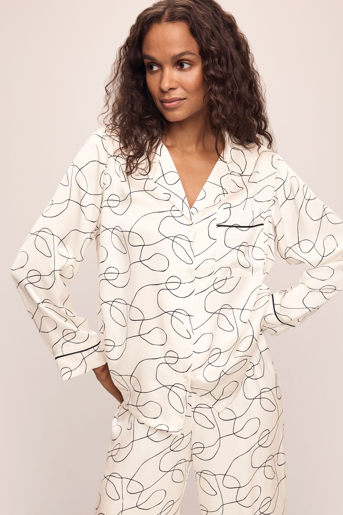 Model wearing Inez Washable Silk Printed Long PJ Set in Scribble Ivory/Black