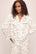 Model wearing Inez Washable Silk Printed Long PJ Set in Scribble Ivory/Black