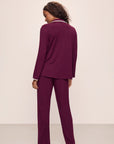 Model wears Frida TENCEL™ Modal Long PJ Set in Plum/Ivory.