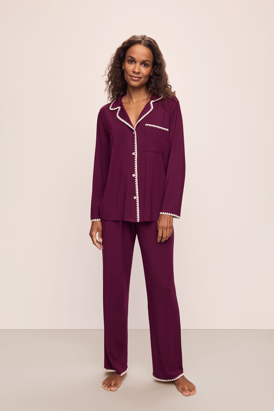 Model wears Frida TENCEL™ Modal Long PJ Set in Plum/Ivory.