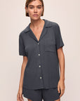 Model wears Gisele TENCEL™ Modal Rib Relaxed Short PJ Set in Graphite.