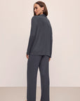 Model wears Gisele TENCEL™ Modal Rib Long PJ Set in Graphite.