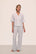 Model is wearing Nautico Long PJ Set in Feeder Stripe White/Peppercorn