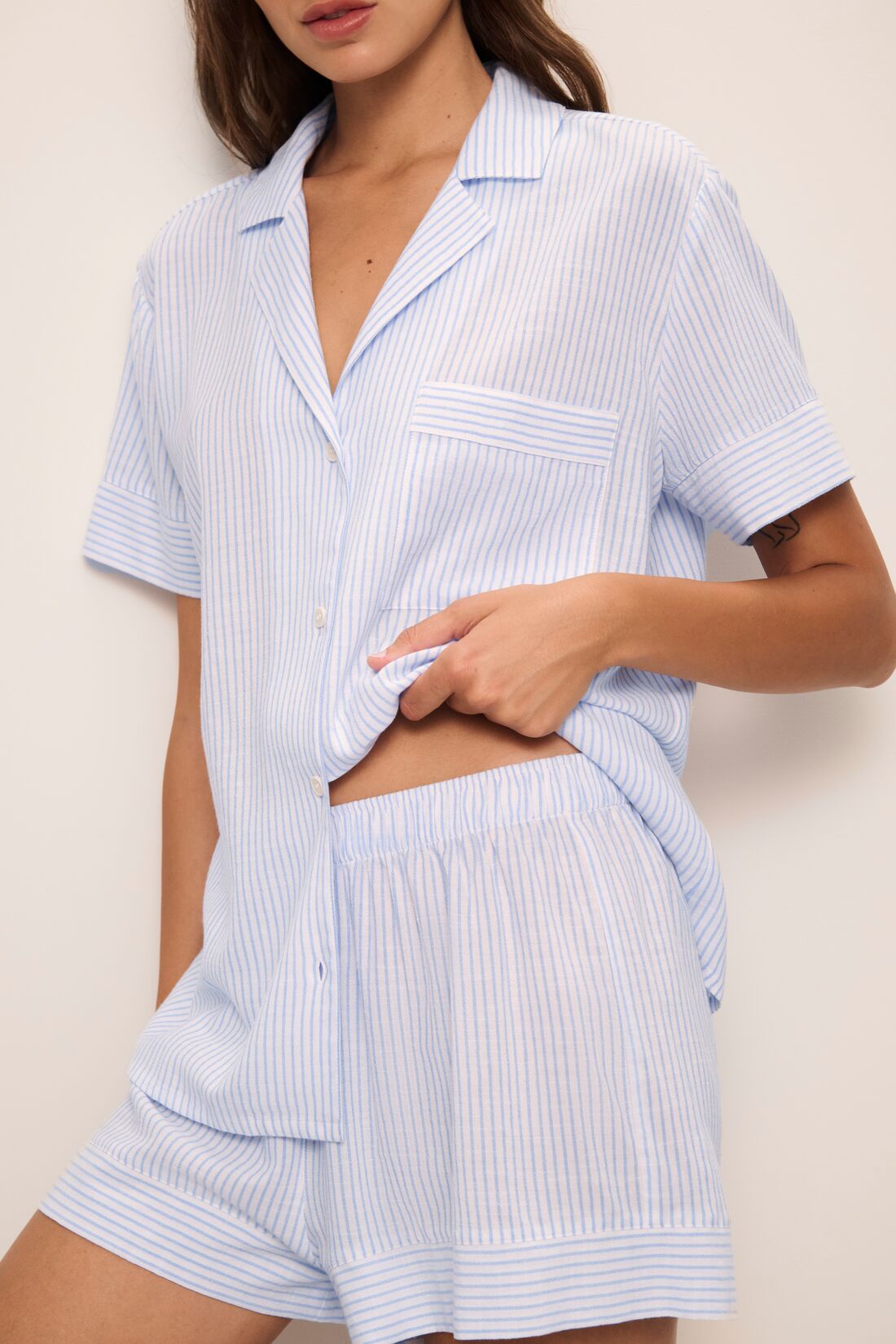 Model is wearing Nautico Shortie Short PJ Set in White/Cornflower Blue