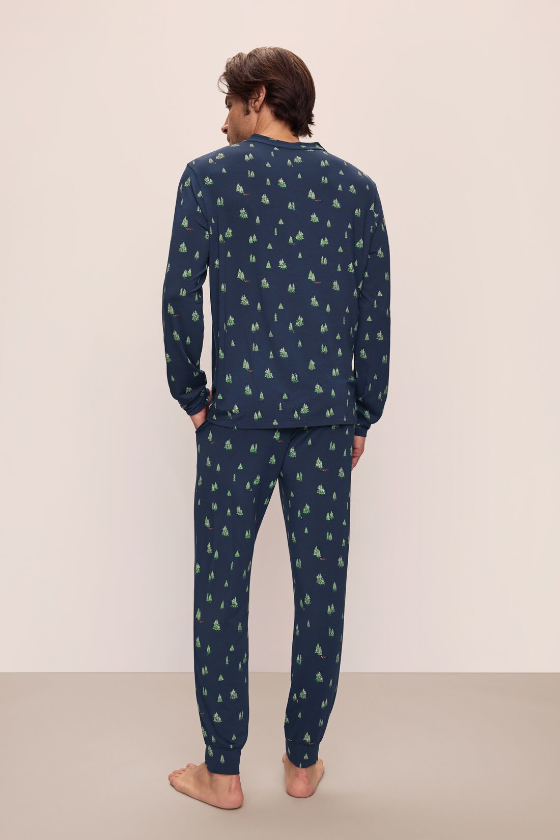 Model wears Henry Printed TENCEL™ Modal Long PJ Set in Woodland Pine Navy/Ivory.