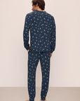 Model wears Henry Printed TENCEL™ Modal Long PJ Set in Woodland Pine Navy/Ivory.