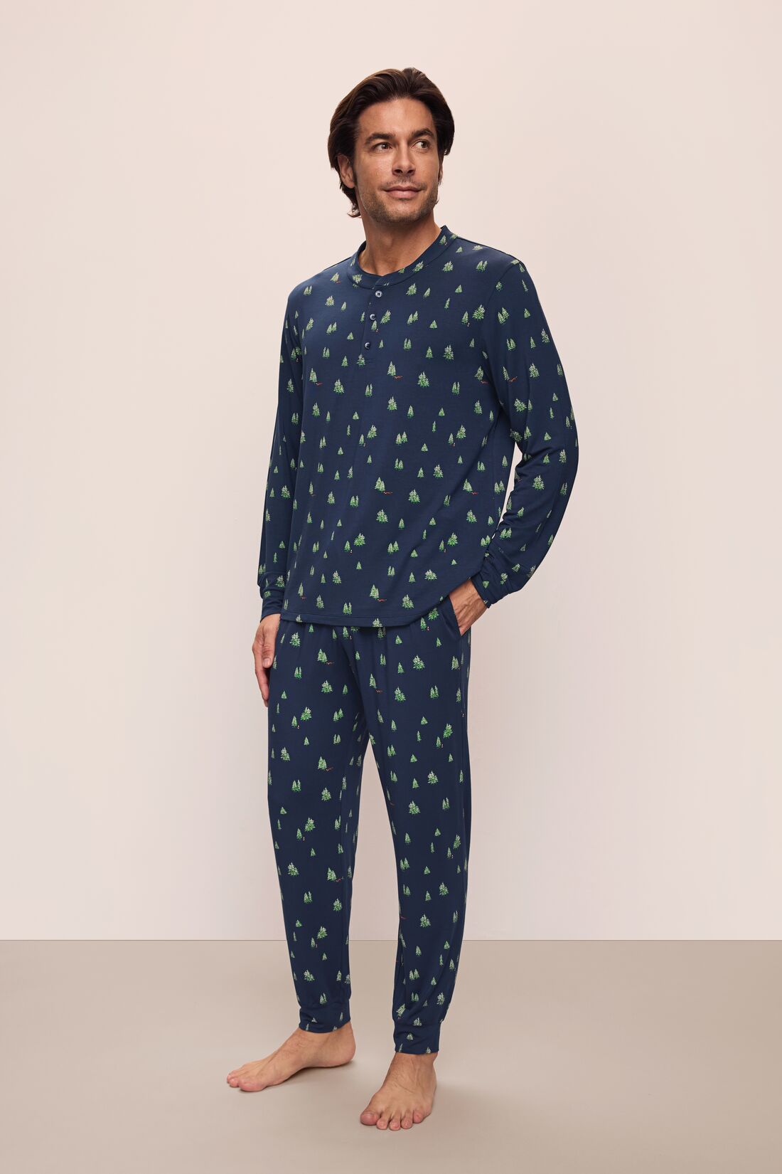 Model wears Henry Printed TENCEL™ Modal Long PJ Set in Woodland Pine Navy/Ivory.