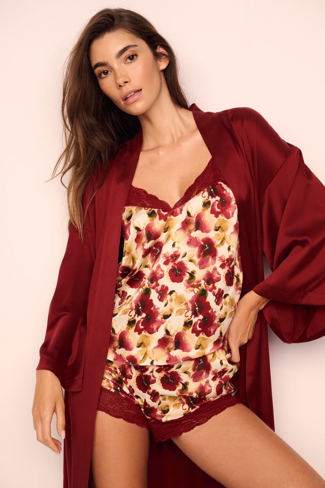 Model is wearing Washable Silk Printed Cami and Short Set and Long Robe in Botanical Flower Merlot and Merlot