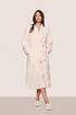 Model is wearing Renew plush Robe in Ivory