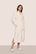 Model is wearing Renew plush Robe in Ivory