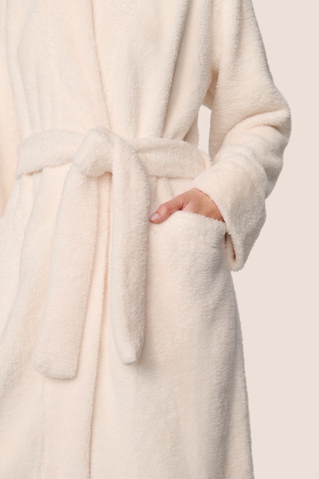 Model is wearing Renew plush Robe in Ivory