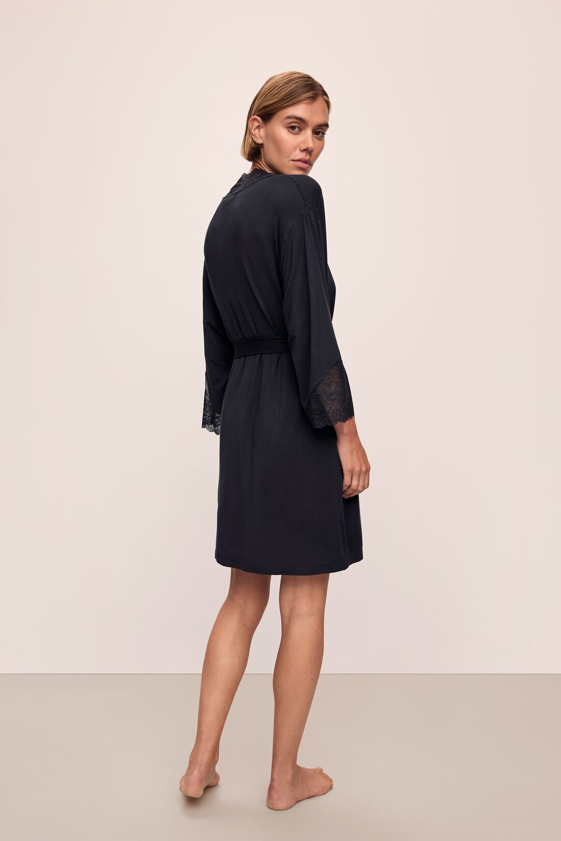 Back image of model wearing Lara TENCEL™ Modal Short Robe in black