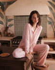 Model wears Frida TENCEL™ Modal Long PJ Set in silver pink/ivory.