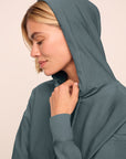 Model is wearing softest sweats hoodie in stone blue