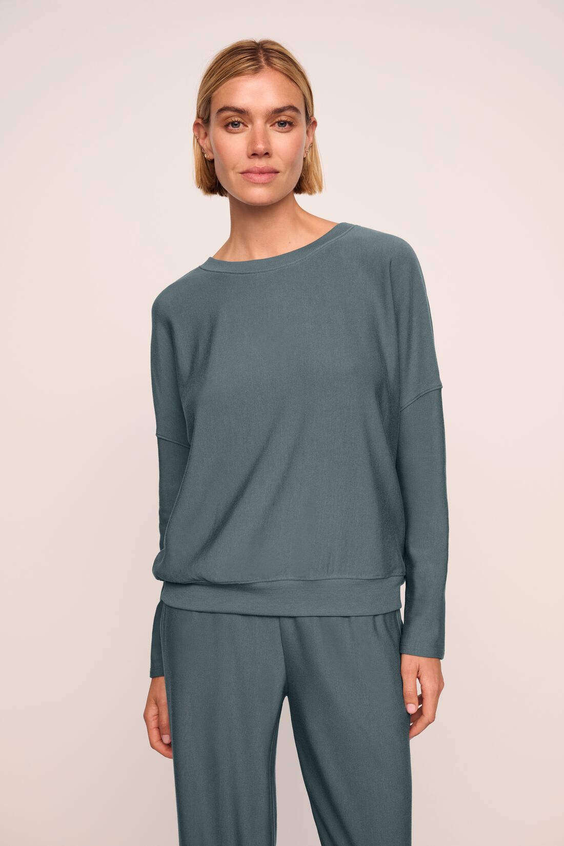 Model is wearing Softest Sweats Boat Neck Pullover  in  Stone Blue