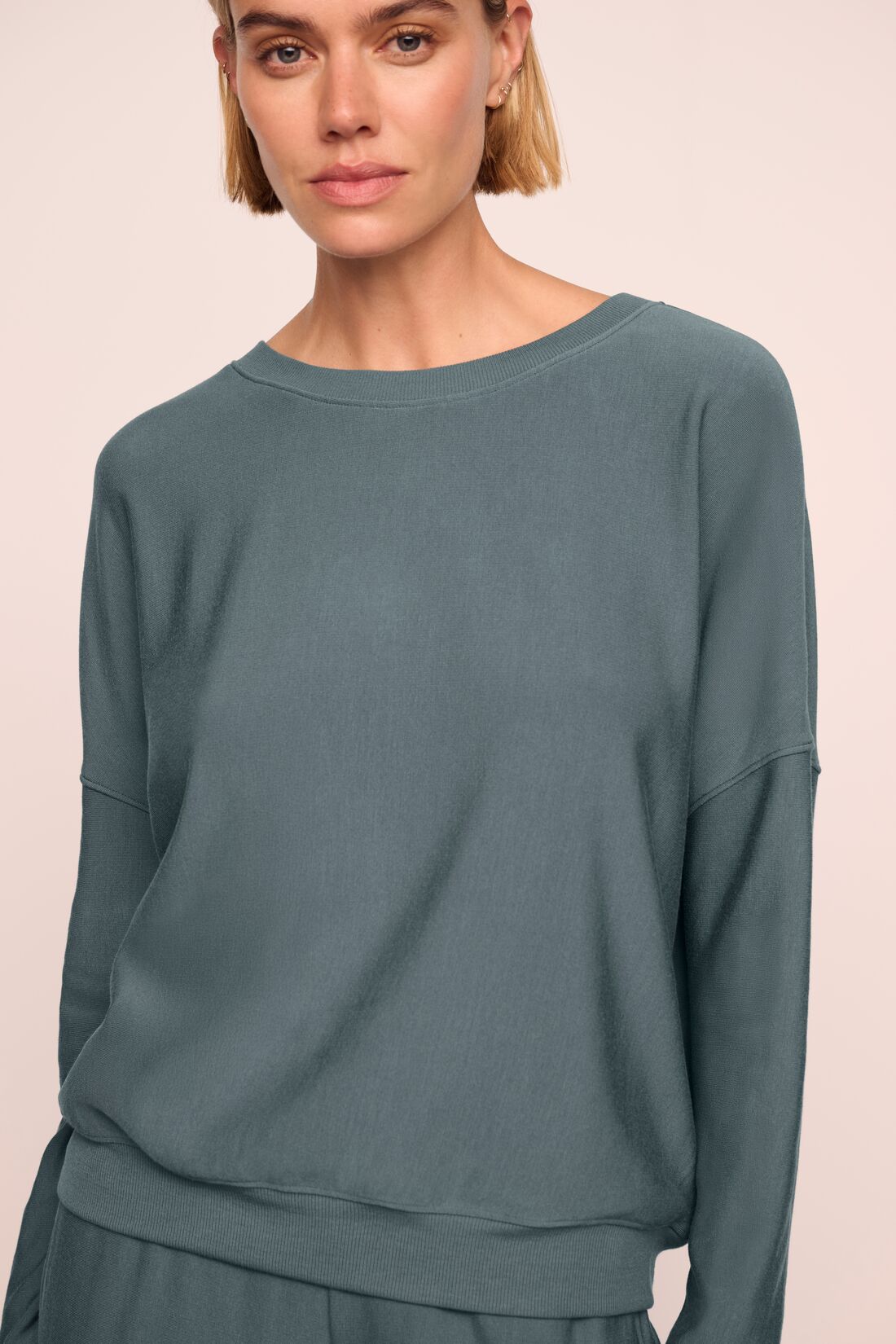 Model is wearing Softest Sweats Boat Neck Pullover  in  Stone Blue