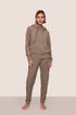 Model is wearing Recycled Boucle Hoodie in Deep Taupe
