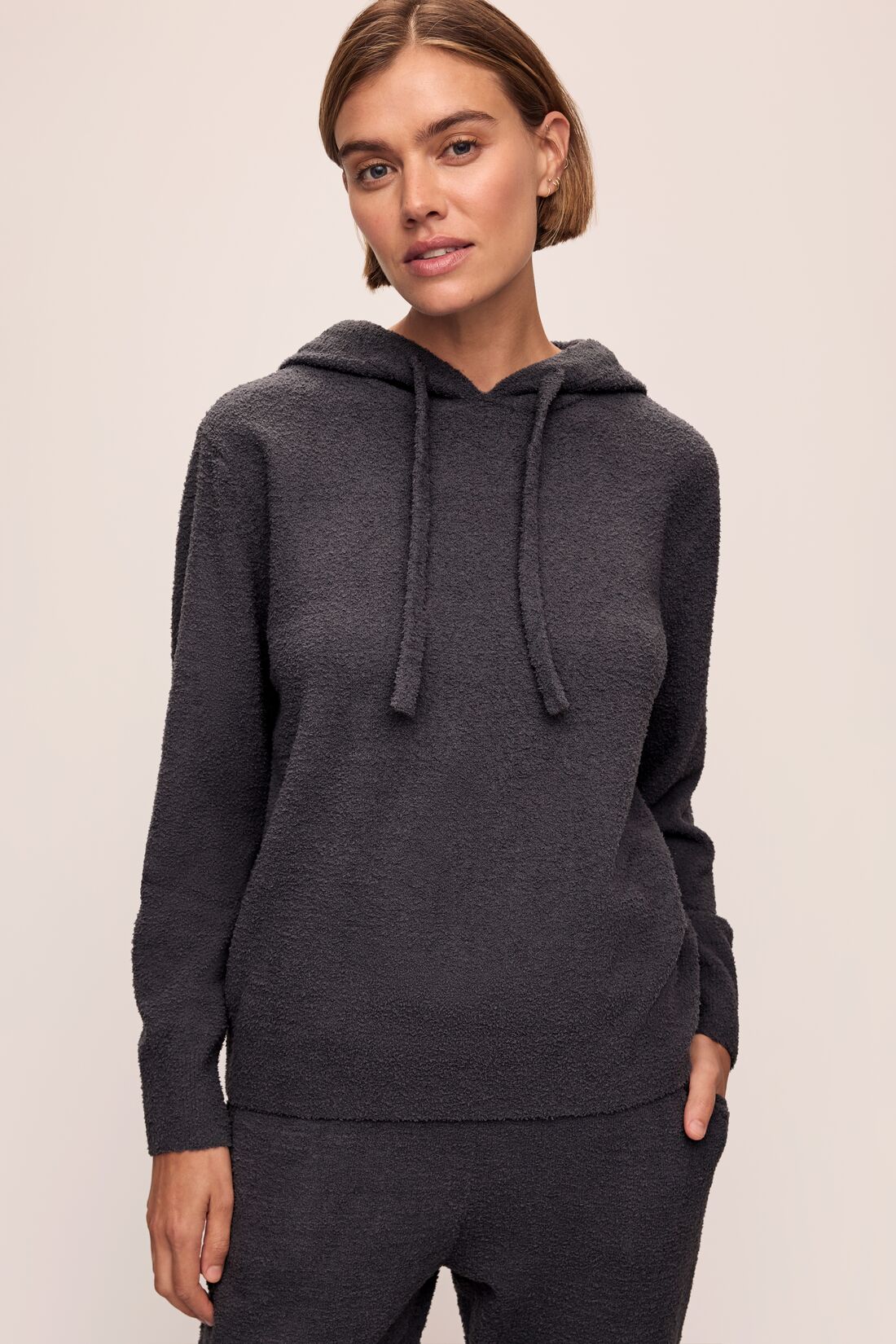 Model in Recycled Boucle Women's Hoodie and Jogger in Graphite