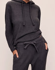 Model in Recycled Boucle Women's Hoodie and Jogger in Graphite