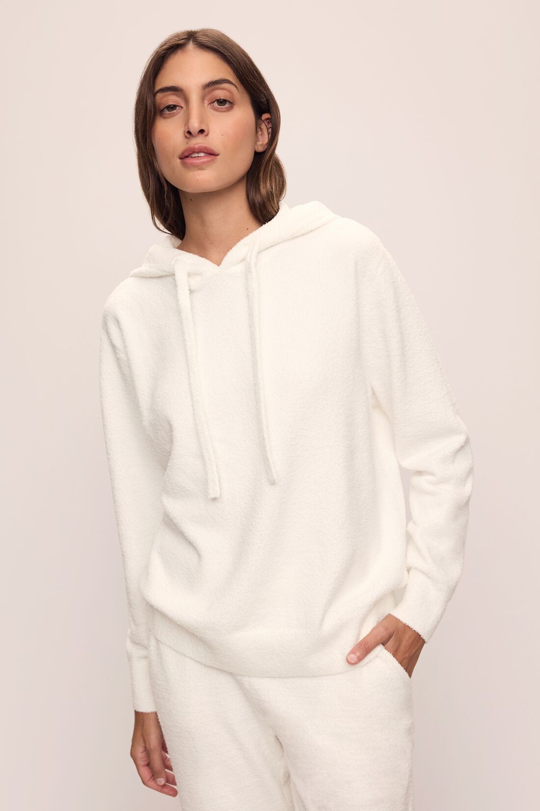 Model in Women&#39;s Recycled Boucle Hoodie and Jogger in Ivory