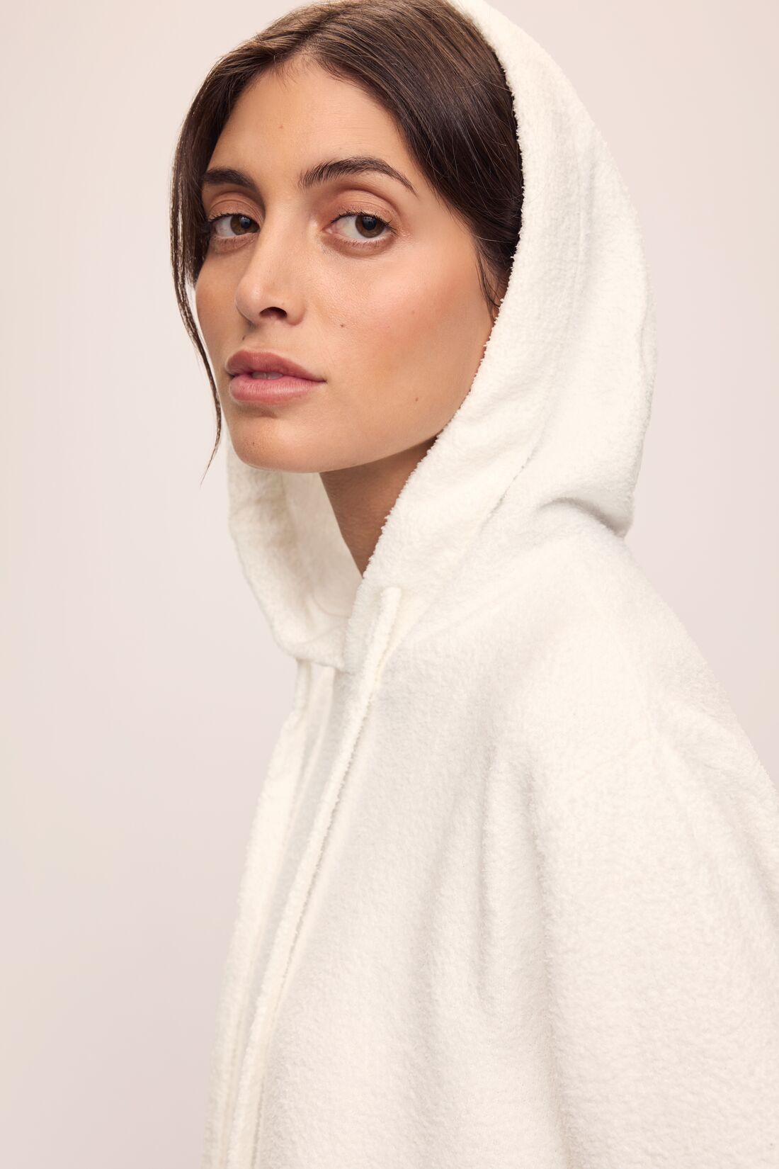 Model in Women&#39;s Recycled Boucle Hoodie in Ivory