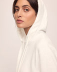 Model in Women's Recycled Boucle Hoodie in Ivory