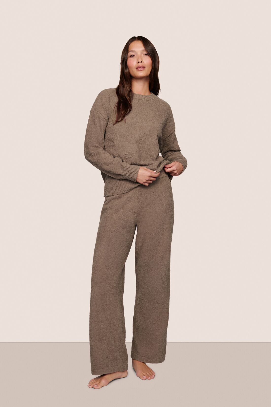 Model is wearing Recycled Boucle Crew Neck Pullover  in Deep Taupe