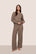 Model is wearing Recycled Boucle Crew Neck Pullover  in Deep Taupe
