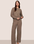 Model is wearing Recycled Boucle Crew Neck Pullover  in Deep Taupe