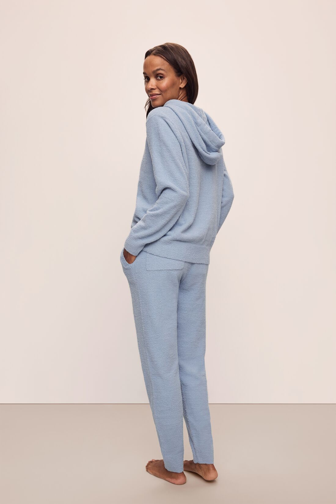 Model in Recycled Boucle Women&#39;s Hoodie and Jogger in Wedgewood