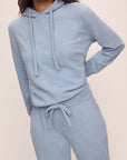 Model in Recycled Boucle Women's Hoodie and Jogger in Wedgewood