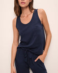 Model wears the Aloe Cotton Tank in Navy.