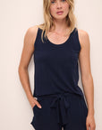 Model wears the Aloe Cotton Tank in Navy.