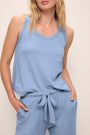 Model wears the Aloe Cotton Tank in wedgewood blue.