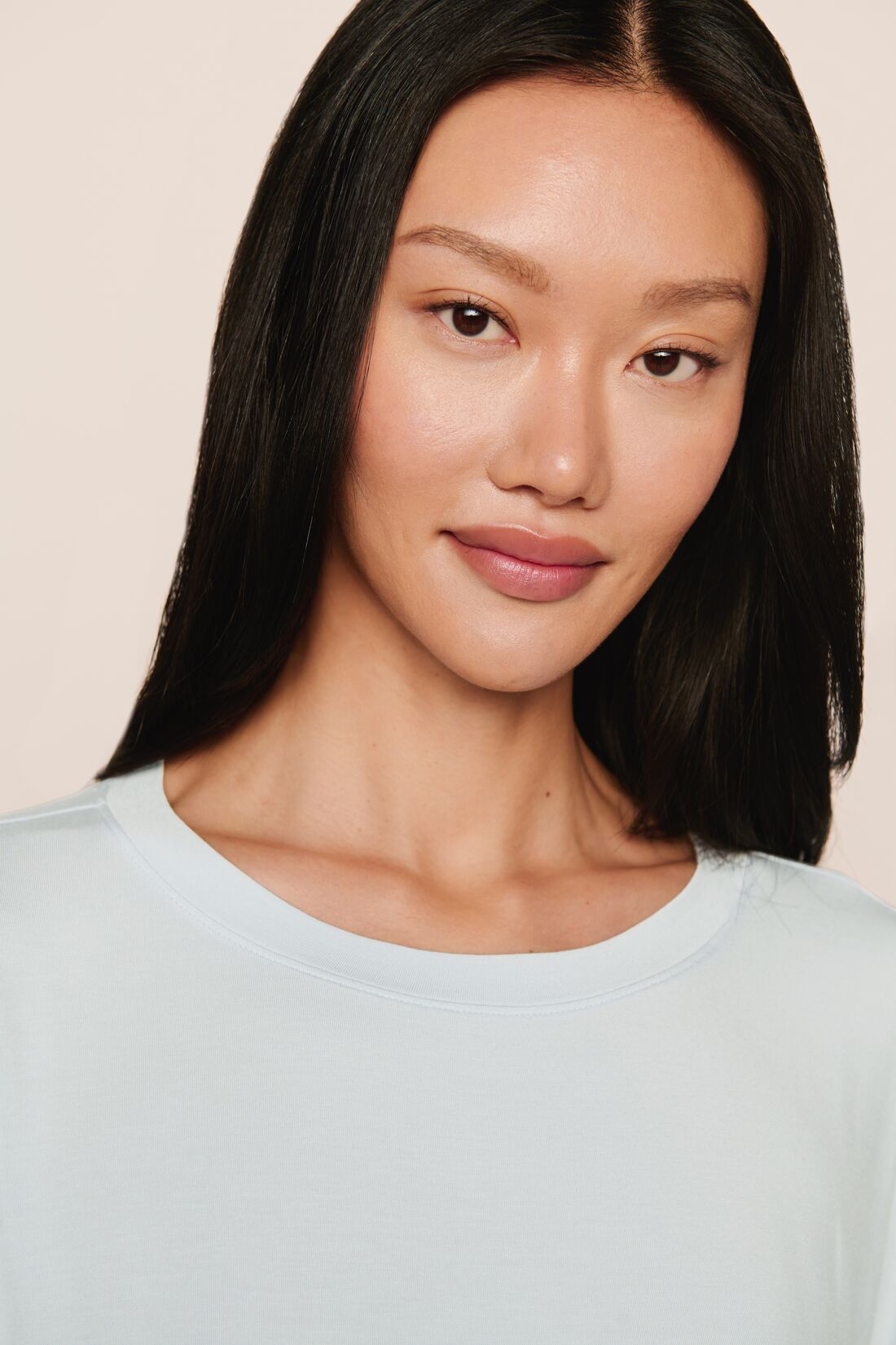 Model is wearing Gisele TENCEL™ Modal Everyday T-Shirt in Ice Blue