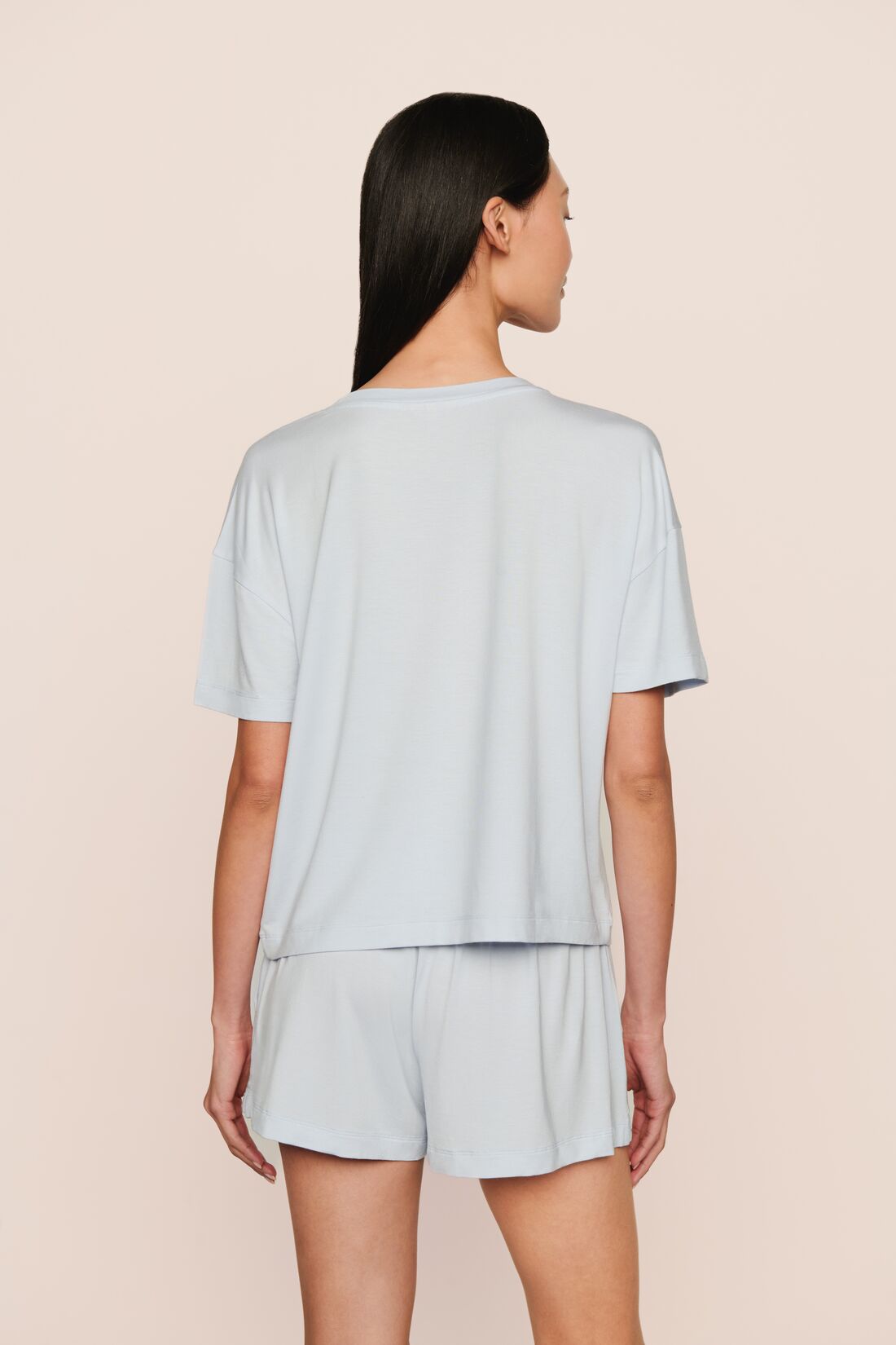 Model is wearing Gisele TENCEL™ Modal Everyday T-Shirt in Ice Blue