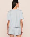 Model is wearing Gisele TENCEL™ Modal Everyday T-Shirt in Ice Blue