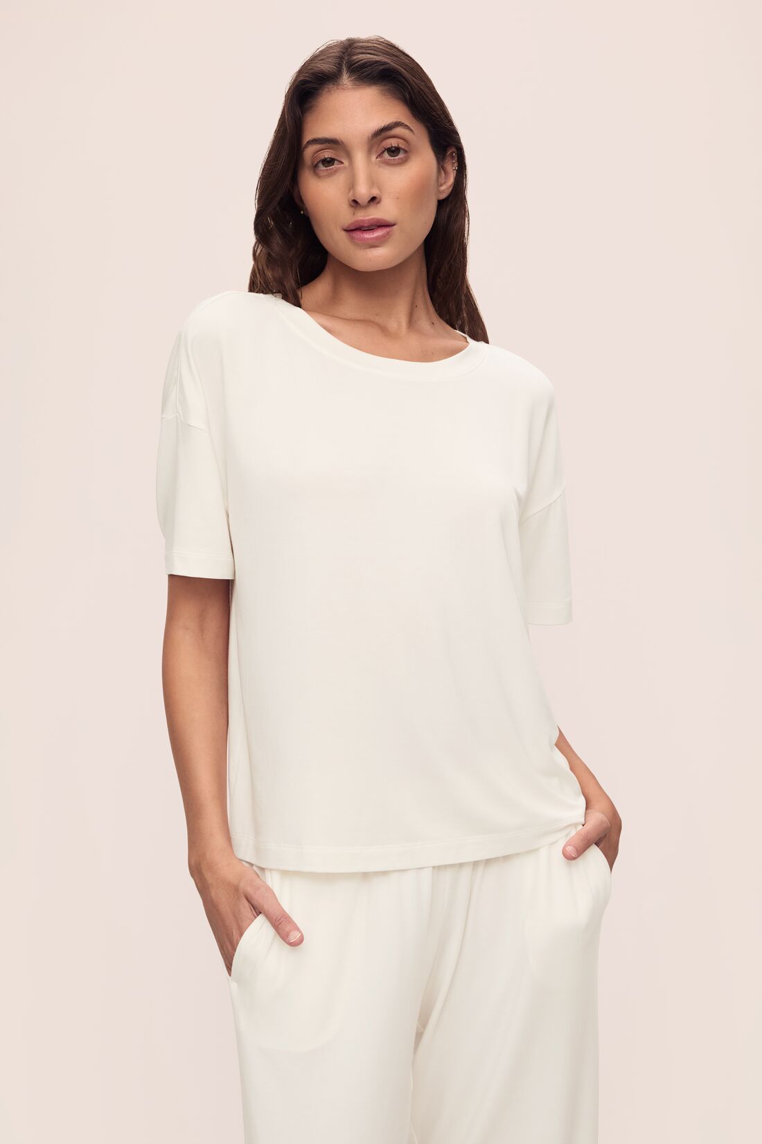 Model wears Gisele TENCEL™ Modal Everyday T-Shirt in ivory.