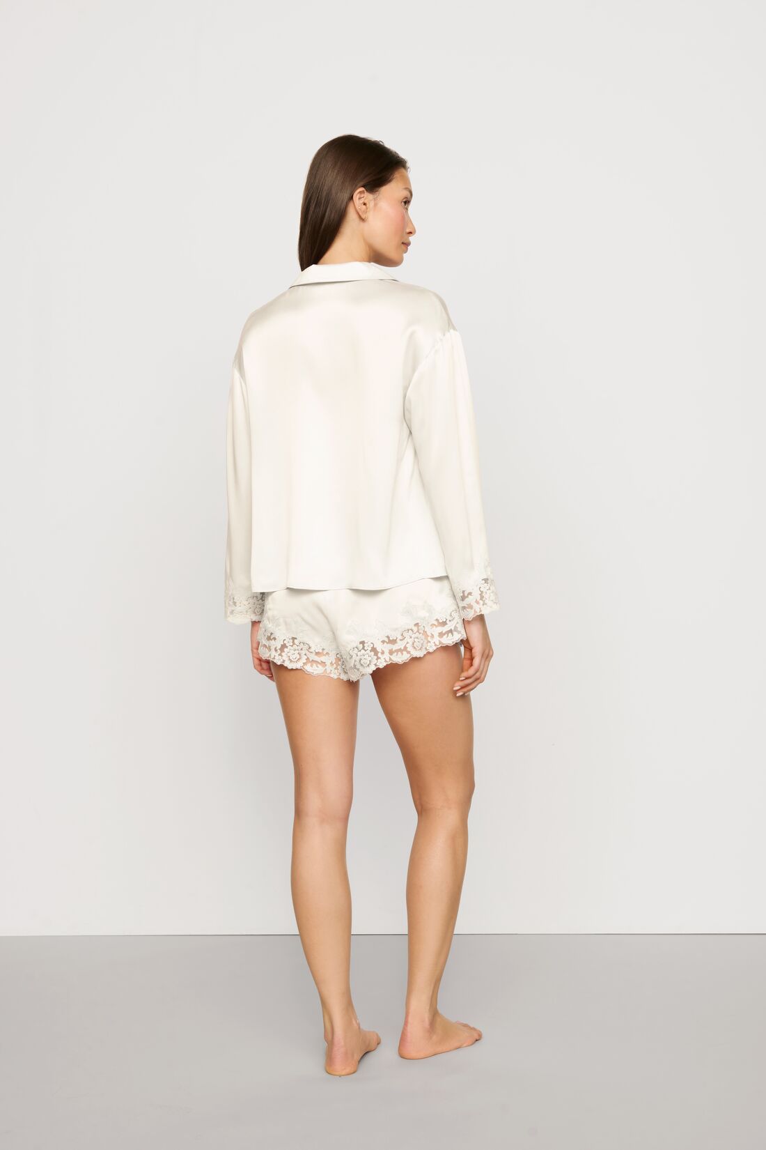 Model is wearing Washable Silk with Lace Embroidery Long Sleeve Top & Short PJ Set in Ivory