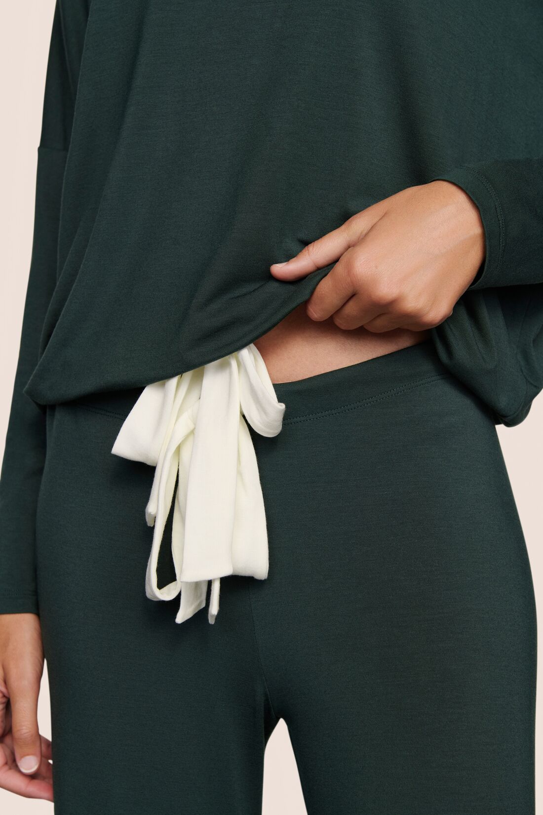 Model is wearing Gisele TENCEL™ Modal Slouchy PJ Set in Pine/Ivory
