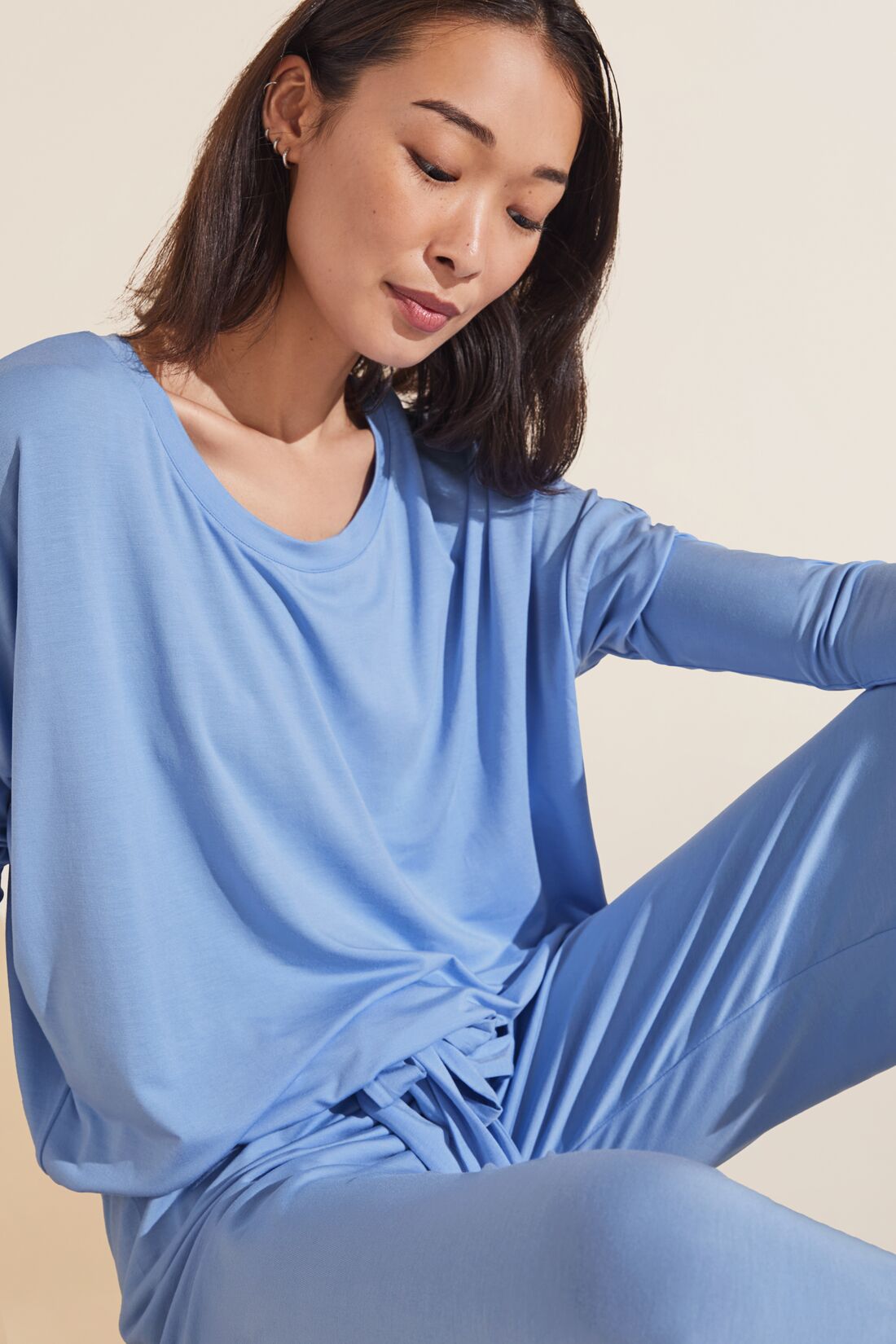 Model is wearing the Gisele TENCEL™ Modal Slouchy PJ Set in Vista Blue.