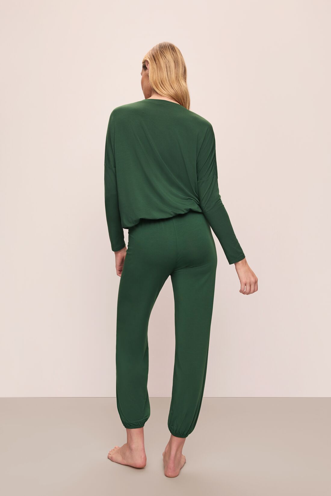 Model wears Gisele TENCEL™ Modal Slouchy PJ Set in Forest Green/Ivory.