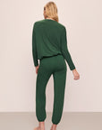 Model wears Gisele TENCEL™ Modal Slouchy PJ Set in Forest Green/Ivory.