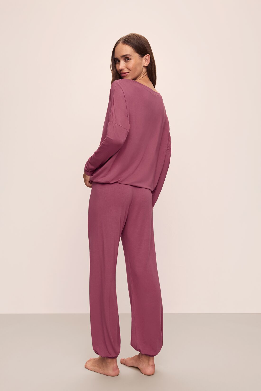 Model wears Gisele TENCEL™ Modal Slouchy PJ Set in Raspberry/Ivory.