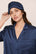 Model Is Wearing Inez Pillow Eye Mask In Navy