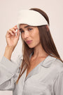 Model wears Inez Washable Silk Eye Mask in Ivory.